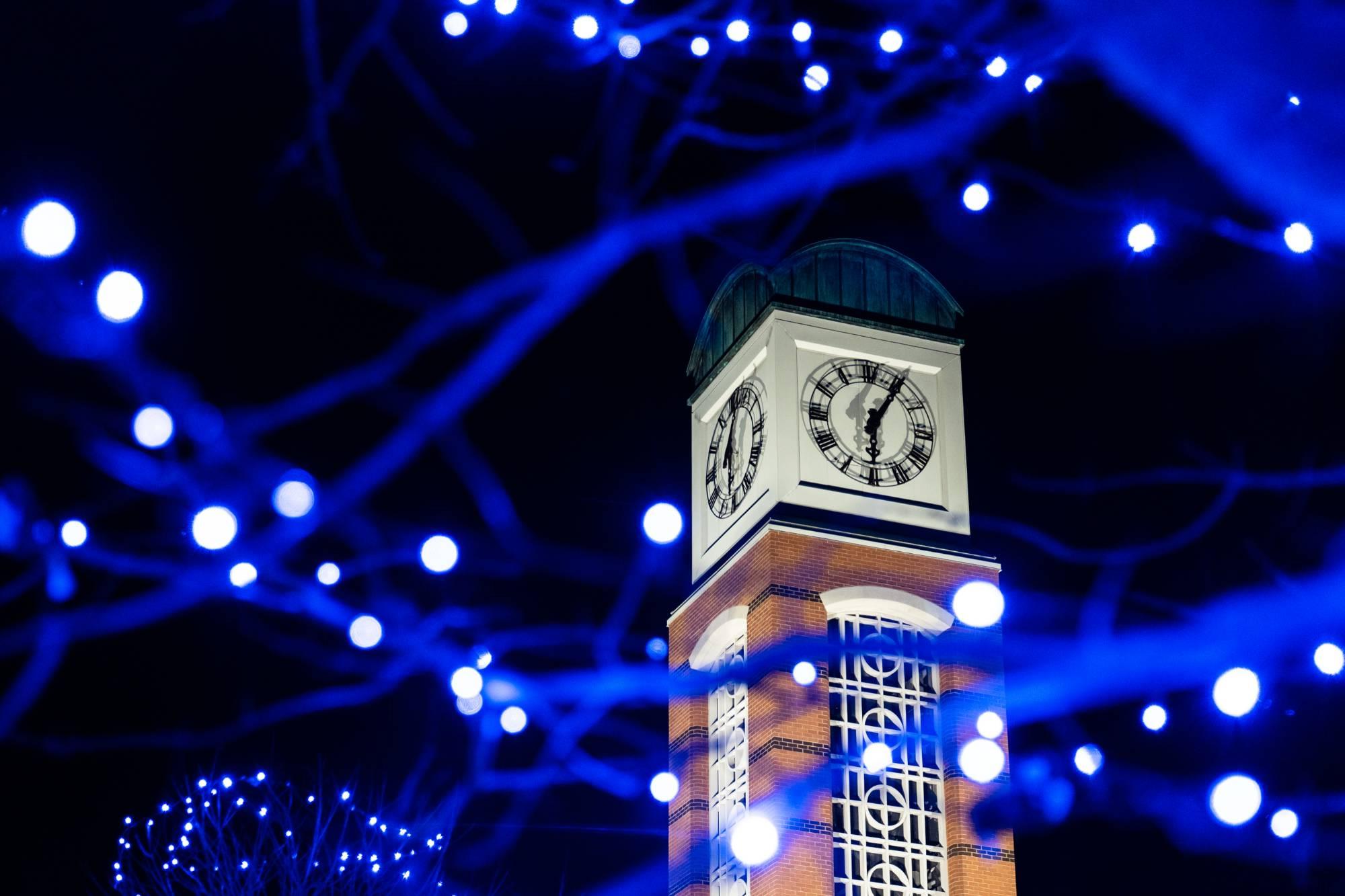 The Cook Carillon Tower surrounded by blue holiday lights